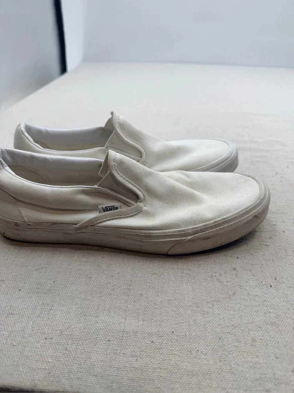 Vans  White Slip-On Sneakers